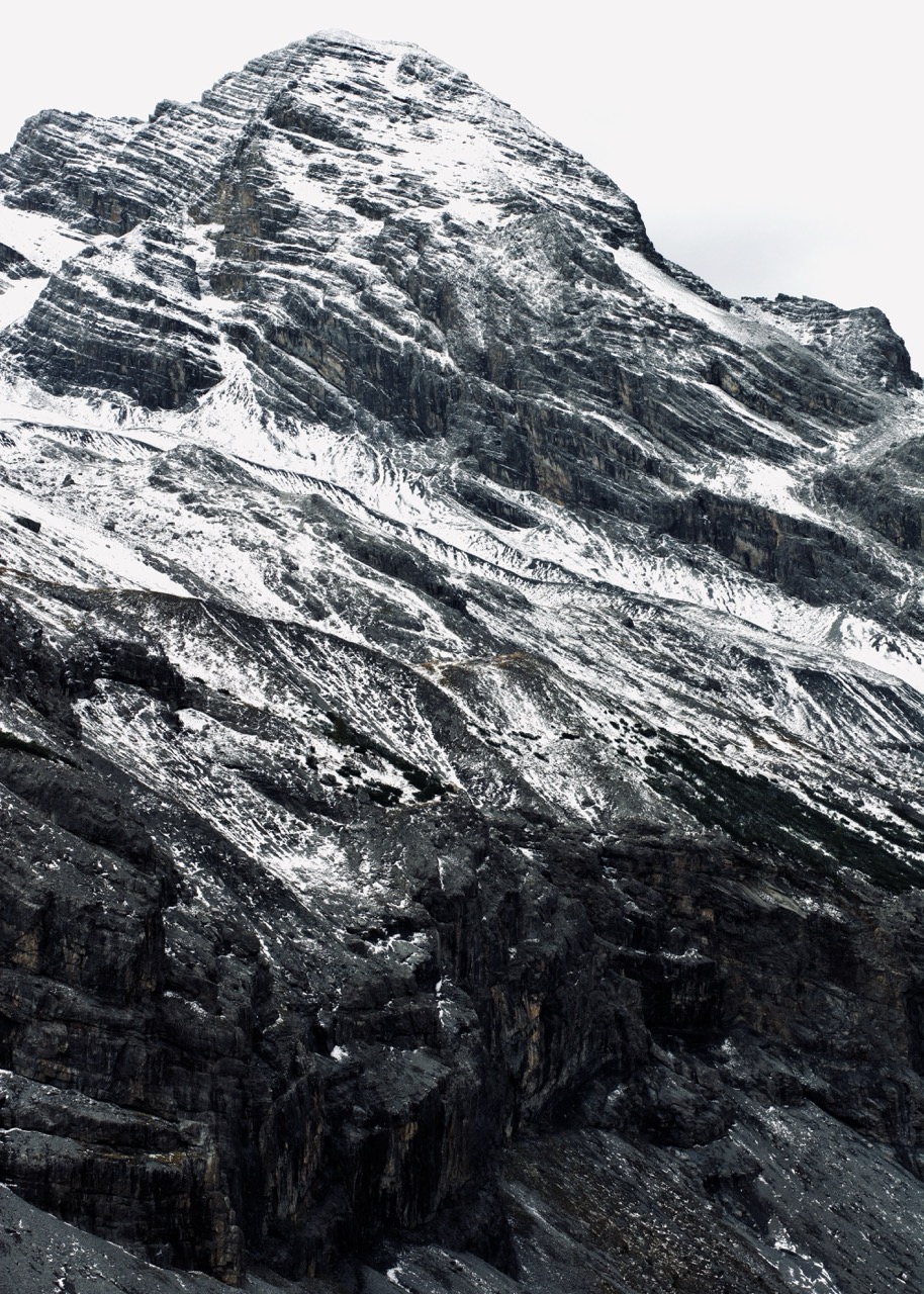 Abstract detail shot of ice, snow and rock, Dolomites, digital photography, 2024