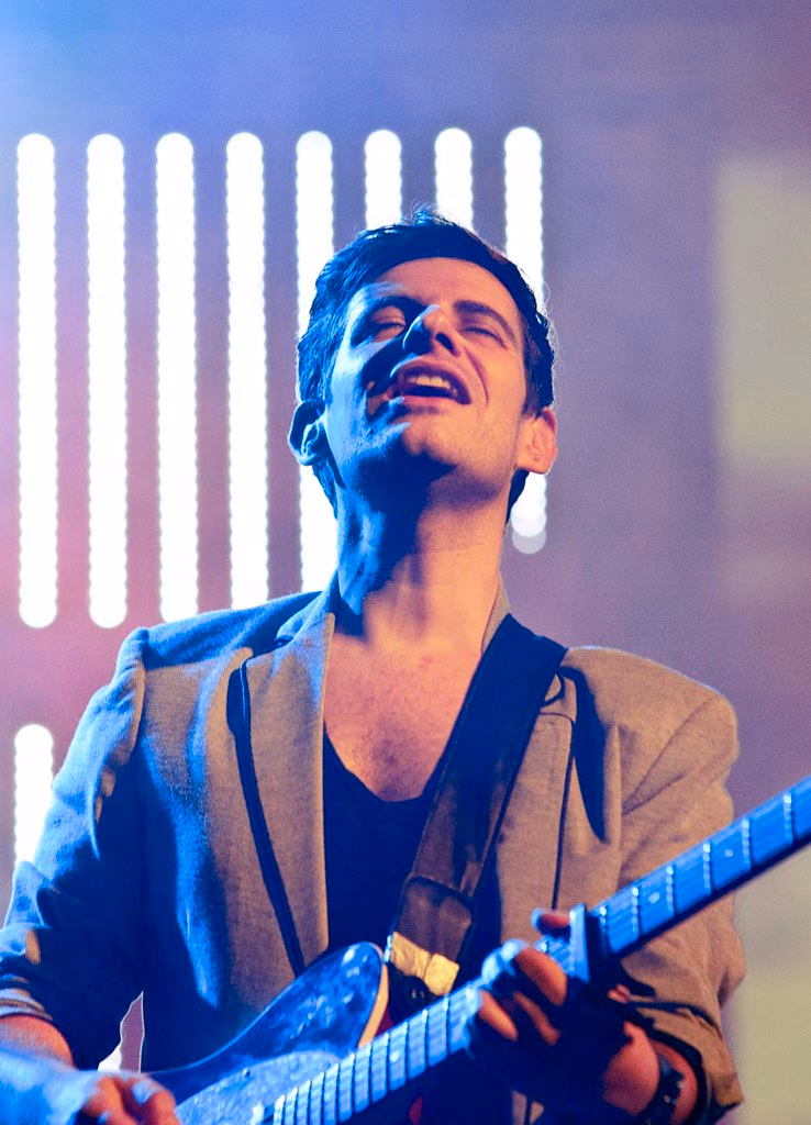 Guitarist looking up into stage lights, Airport Impressions live, Beland Festival, Malta